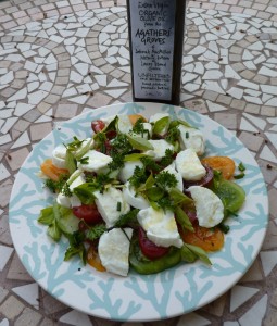 Tomato, mozzarella and herb salad with Avlaki olive oil